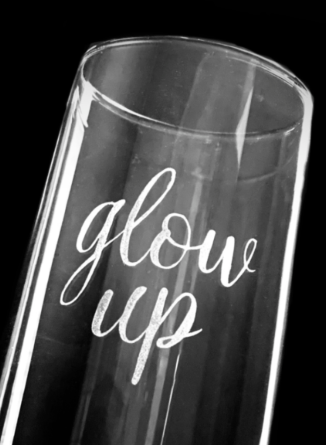 Elegantly etched glassware pieces with intricate designs by Creative Adventure Co.
